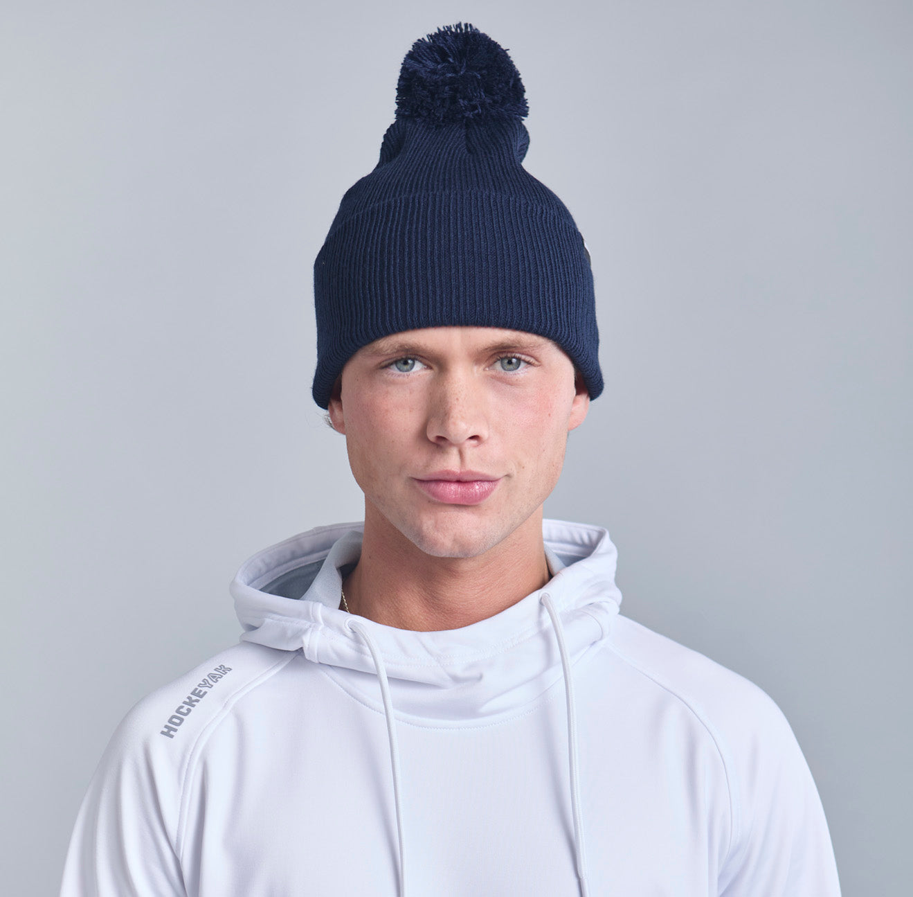 NAVY POM BEANIE